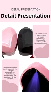 Close-up of heart-shaped jewelry box with LED light and diamond cut lacquer surface
