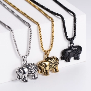 Detailed view of elephant pendants in silver, gold, and black finishes with box chains
