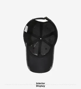 Interior view of black cotton baseball cap showing 6-panel design and quality stitching