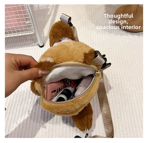 Detail of cute brown plush dog bag showing zipper closure and interior storage space