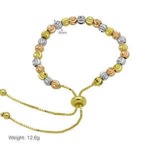 Detailed view of 6mm tri-color beads and 12.6g weight on an adjustable slider bracelet