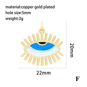 Macro view of gold plated evil eye pendant with 22mm width and 5mm hole size details