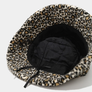 Plush leopard print bucket hat with quilted lining and adjustable inner drawstring