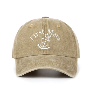 Close-up of First Mate embroidery and anchor design on khaki washed cotton baseball cap