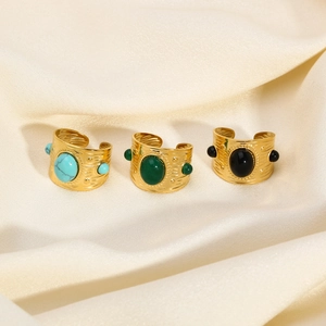 French vintage gold titanium steel ring set with turquoise stones and hammered texture