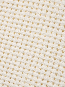 Gros plan détaillé sur la texture en maille crochet blanc avec motif de grille ajouré