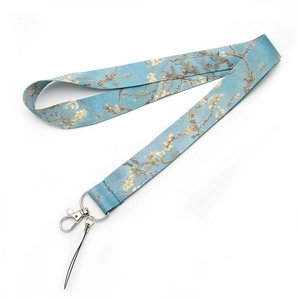 Detail of blue Almond Blossom art print lanyard with silver metal lobster clasp