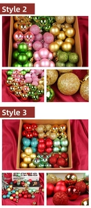 Detail of Christmas balls featuring matte, glitter and electroplated textures in a gift box
