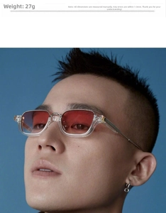 Close-up of rectangular transparent sunglasses with red lenses and 27g lightweight frame