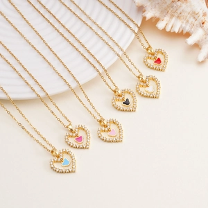 Elegant gold heart pendant necklace featuring zircon pavé and colorful enamel in six styles