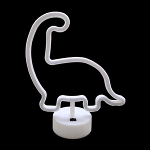 Detail of dinosaur LED neon light with round base and manual toggle switch on black background