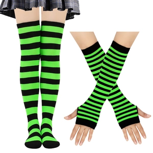 Detail of neon green and black striped thigh high socks and matching long fingerless gloves