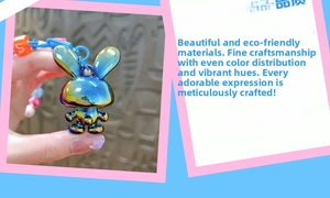 Iridescent metal rabbit pendant with colorful beads and blue plastic hook detail