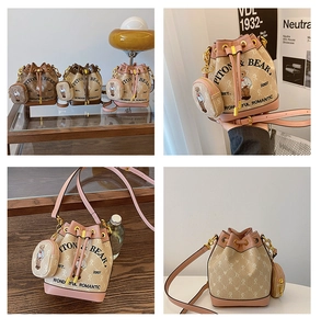 Detailed view of canvas bucket bags with teddy bear prints and matching coin purses