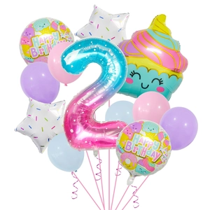 Close-up of number 2 foil balloon and cupcake balloons for 2nd birthday party set