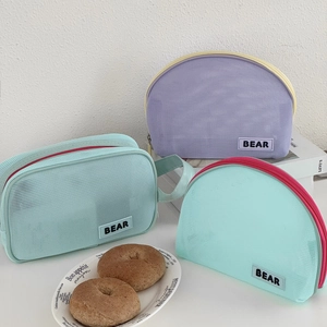 Mesh makeup bag set with semi-circle and rectangular shapes in summer contrast colors