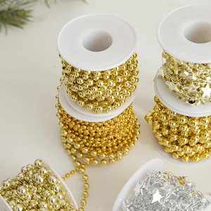 Golden and silver beaded Christmas tree chain rolls for festive DIY decoration and scene layout