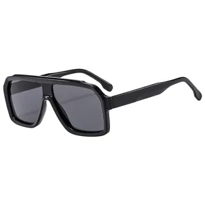 Retro oversized square black sunglasses with wide frame and dark grey lenses for men and women