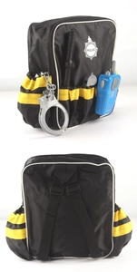 Detail view of children police role play backpack set with toy radio and handcuffs