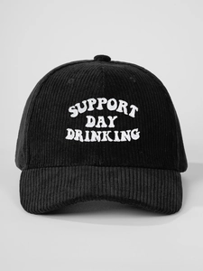 Detail of black corduroy texture and white Support Day Drinking embroidery on baseball cap