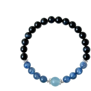 Handmade beaded bracelet with natural moonstone, obsidian, and silver petal spacers