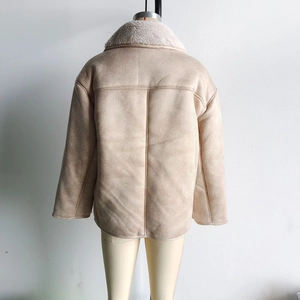 Rear view detail of a beige faux suede jacket with white faux shearling collar and seams