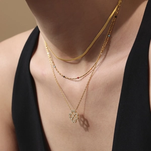 Layered gold clover necklace with 5A zircon accents and delicate snake chain for women
