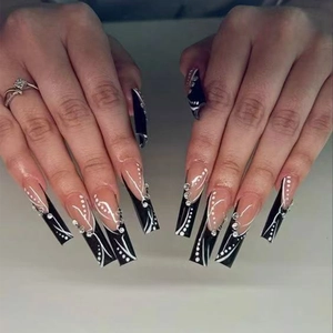 Long coffin press-on nails with black french tips and silver rhinestone accents