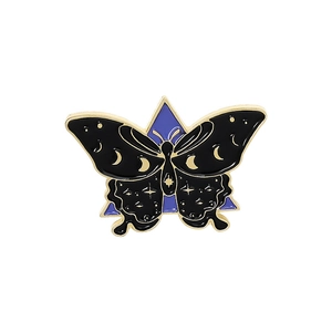 Luminous butterfly enamel pin with moon stars patterns on a purple triangle base