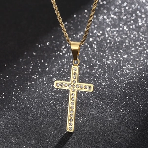 Elegant gold stainless steel cross necklace with crystal pavé on a twisted chain