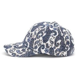 Close-up of navy blue paisley baseball cap with detailed fabric texture and embroidery