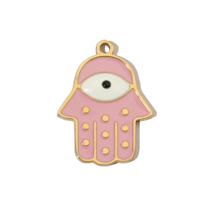 Detailed view of pink enamel Hamsa hand pendant with golden eye and dots on white background