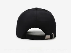 Detail of black cotton baseball cap rear view with adjustable silver metal buckle strap