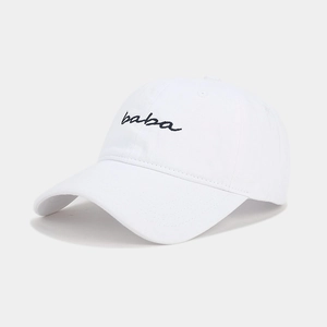 Close-up of black baba embroidery on a white washed cotton baseball cap texture
