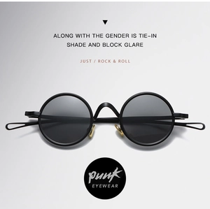 Detail der Retro-Punk-Sonnenbrille mit schwarzem Mattrahmen und hohlen Bügelenden