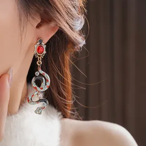 Vintage snake drop earrings with red stone and colorful enamel in boho style