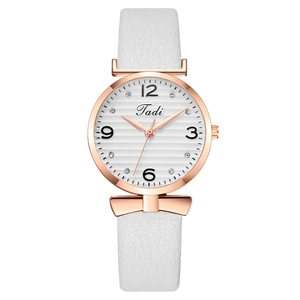 Elegant white leather watch for women with rose gold bow case and rhinestone dial details