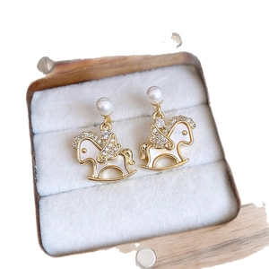 Exquisite gold-plated rocking horse earrings with mother-of-pearl and pearls