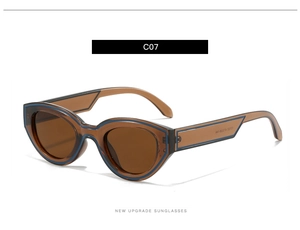 Detailansicht der ovalen Vintage-Sonnenbrille in Bernstein mit breiten Bügeln