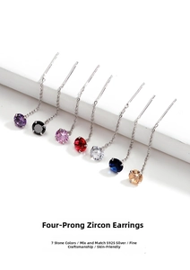Macro detail of S925 silver threader earrings with four-prong set colorful zircons