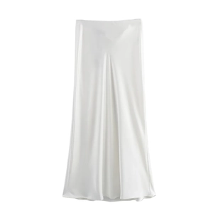Detailed view of white satin midi skirt showing elegant drape and silky fabric texture