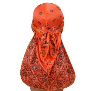 Bright orange paisley durag in silky satin fabric with long tail for hair styling