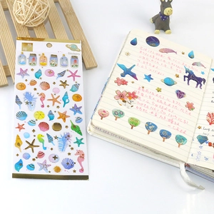 Marine star and galaxy clear stickers with gold foil accents for stationery DIY