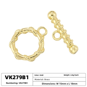 Macro detail of gold-plated brass OT toggle clasp jewelry connector with twisted round ring