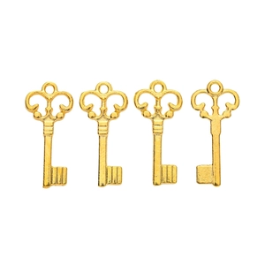 Set of four vintage golden metal skeleton keys for DIY jewelry making and crafts