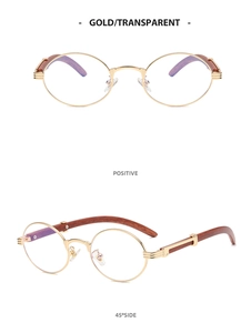 Detail of round sunglasses featuring gold metal frames and wood grain textured temples