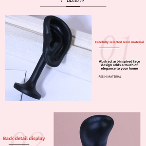 Matte black resin ear model for jewelry display and earring photography props