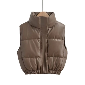 Detailed close-up of brown PU leather puffer vest featuring standing collar and zipper