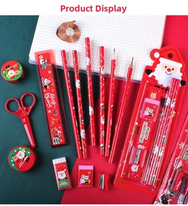Close-up of Christmas stationery set with pencils, ruler, eraser, and scissors
