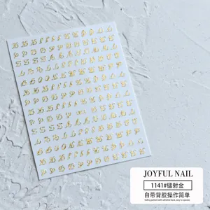 Detail van 3D gouden laser alfabet nagelstickers met zelfklevende achterzijde laag